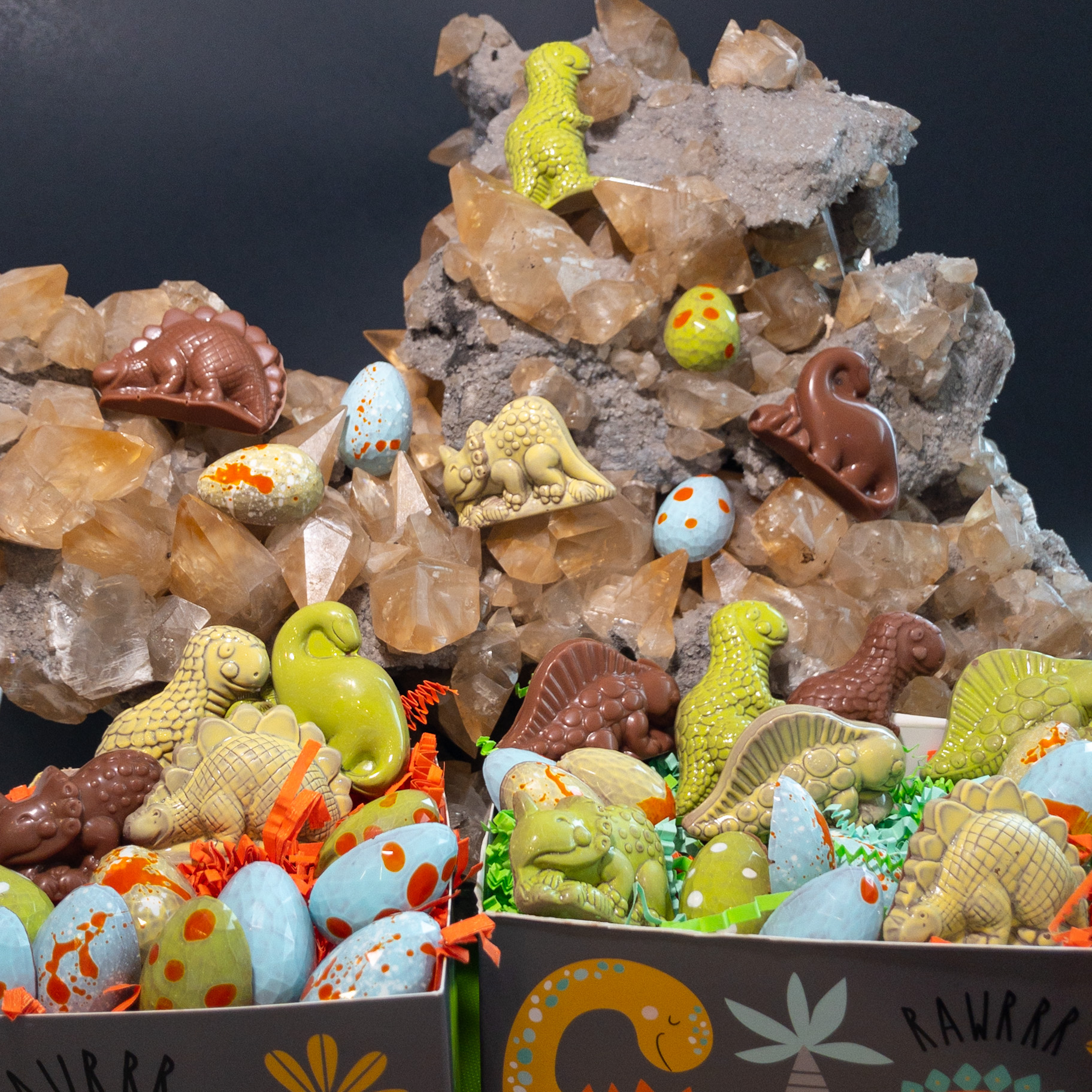 Dinosaur gift boxes filled with chocolate dinosaurs and dinosaur eggs