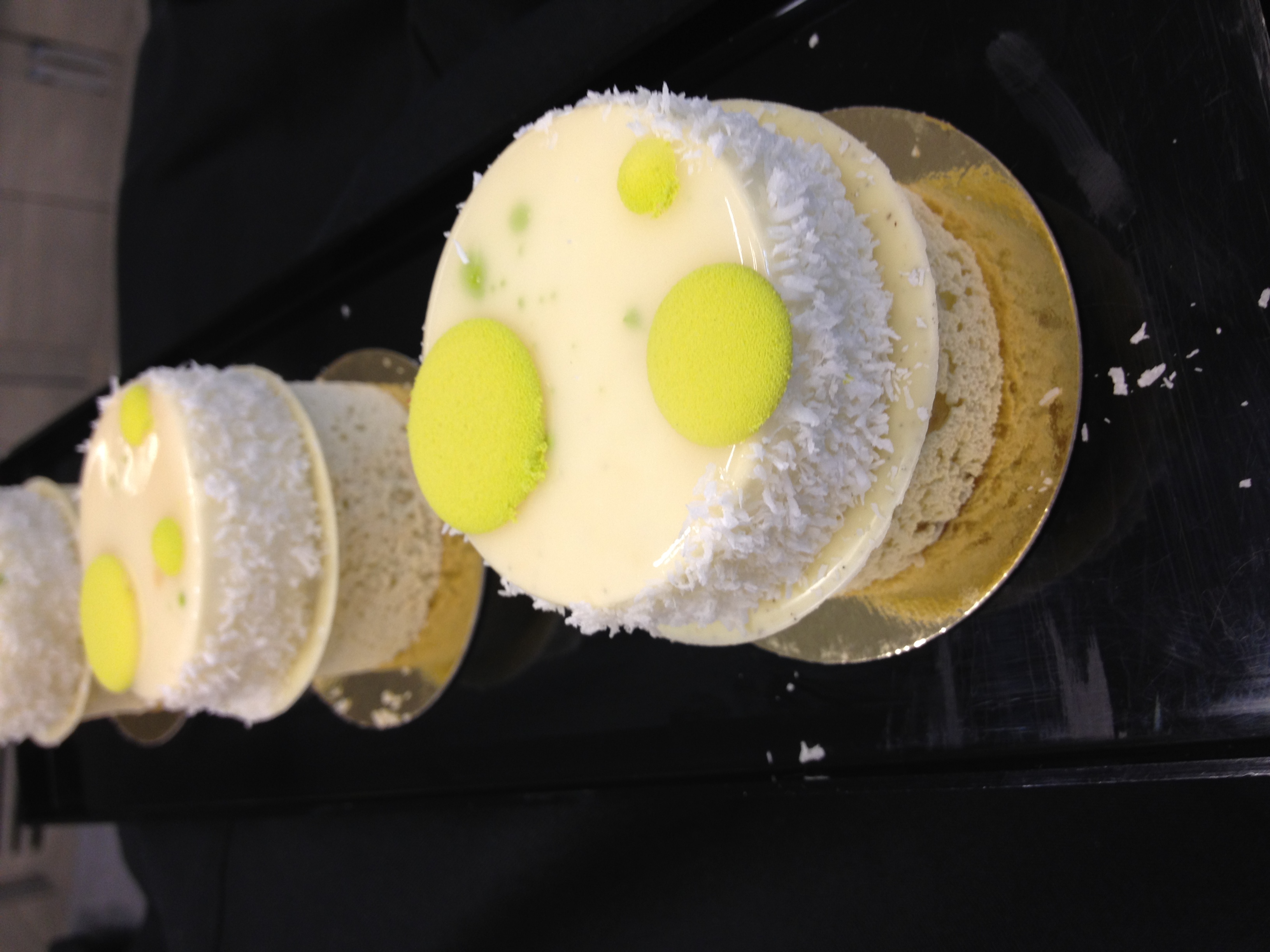 Coconut mousse petits gâteaux with lime gelée decoration